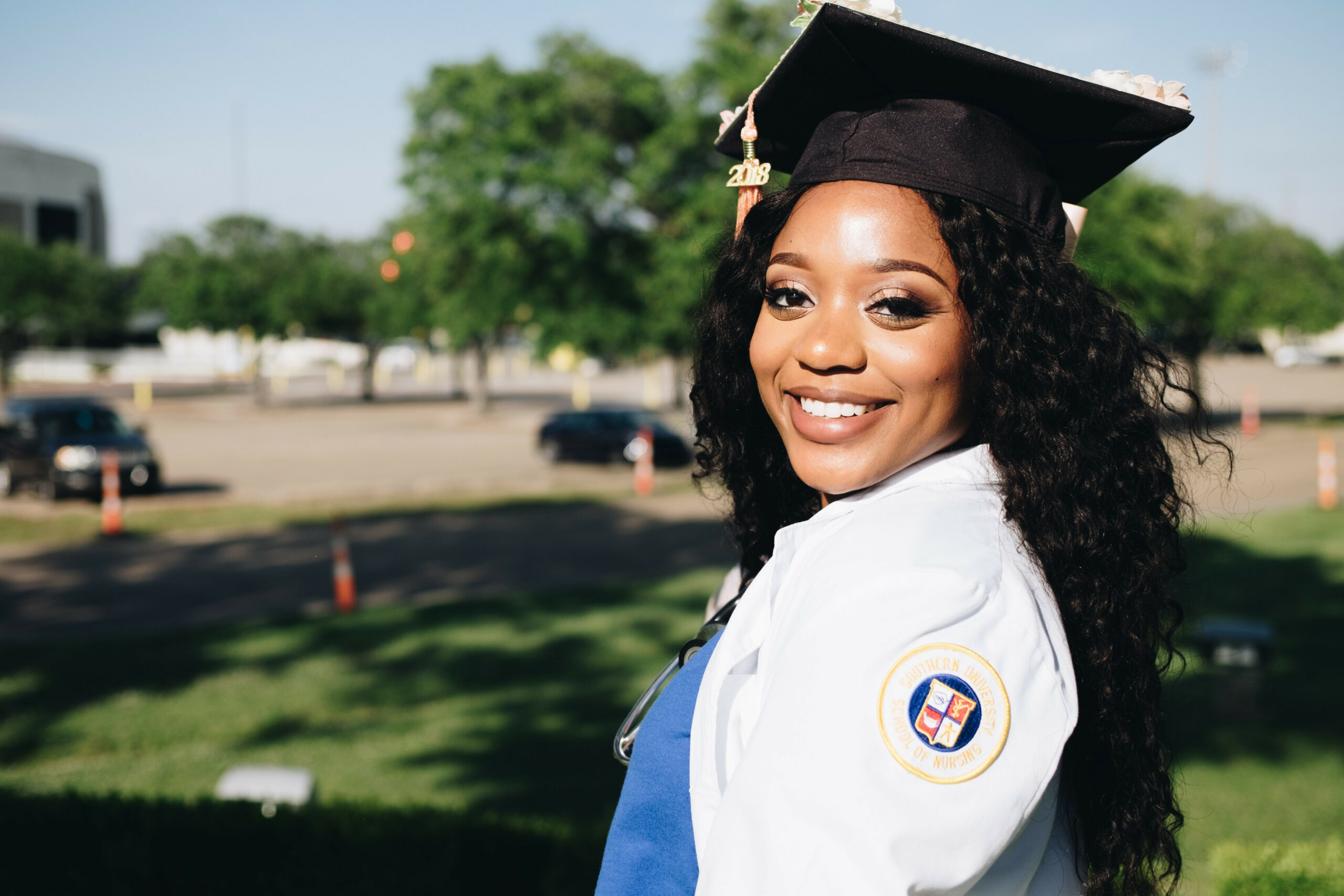 African student wearing a graduation cap, symbolizing scholarship achievement